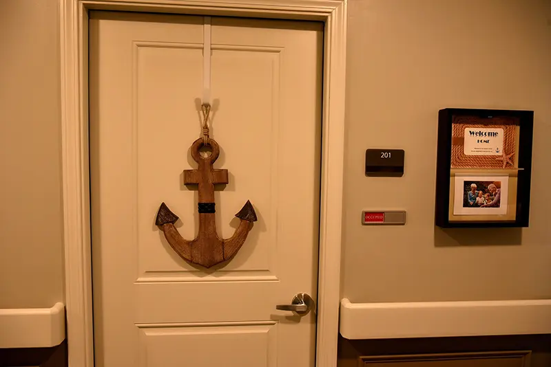 residence door decorated with wooden anchor