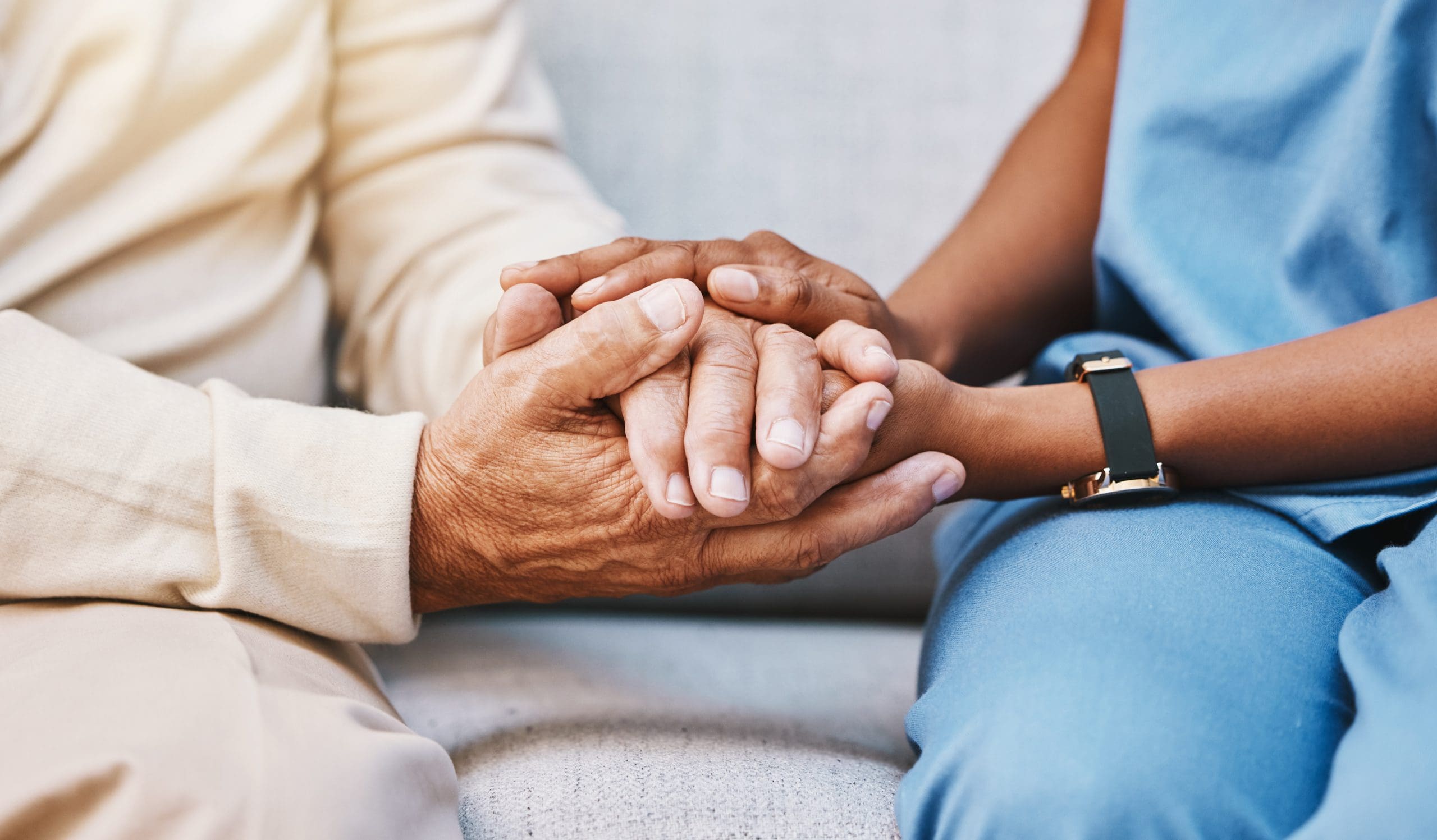Caregiver offering emotional support to a resident at Charter Senior Living of Hopkinsville in KY.